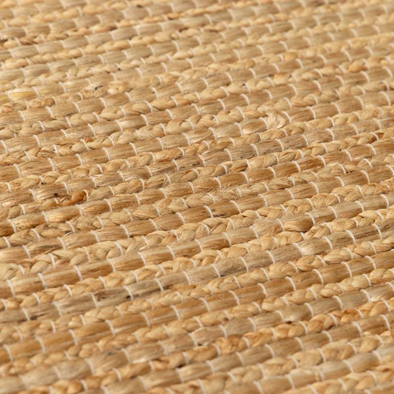 Hand-loomed jute and cotton rug with botanical texture
